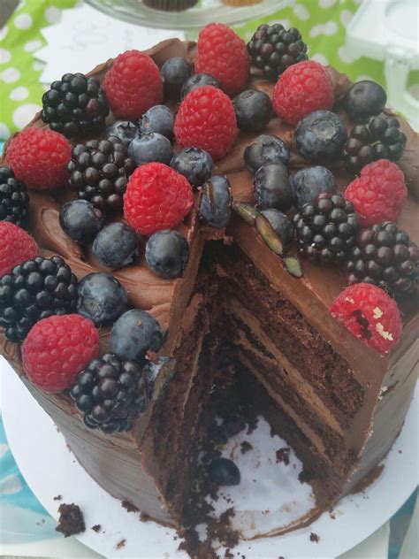 Layered rich chocolate ganache cake top with Forest fruits | Cake toppings, Chocolate ganache ...