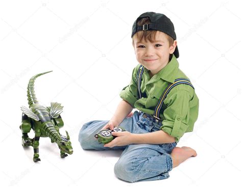 Young boy playing with dinosaur Stock Photo by ©paleka 5255976