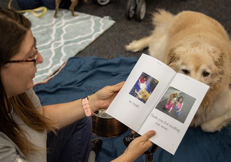 Local children “read to a dog” at Reedley library - Mid Valley Times