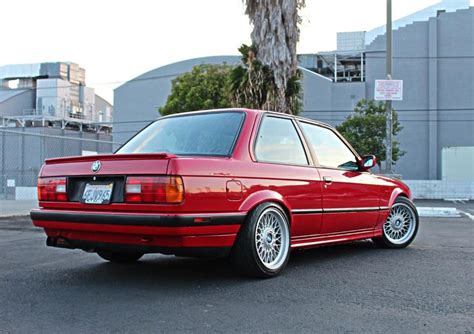 Red BMW E30 Coupe in Parking Lot