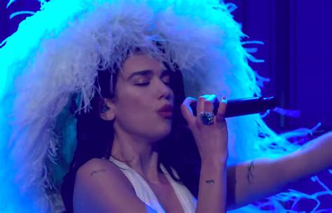 Dua Lipa Wore a Giant Feathered Hat While Performing on SNL | POPSUGAR ...