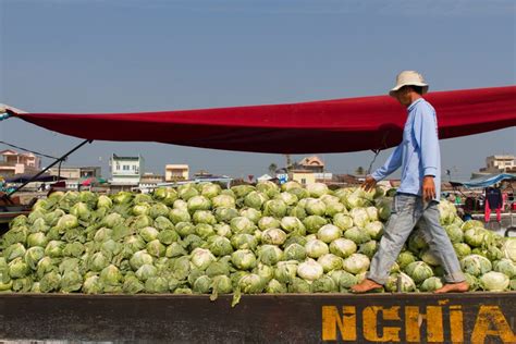 The Colorful Floating Markets of Vietnam’s Mekong Delta - Victoria Voyages