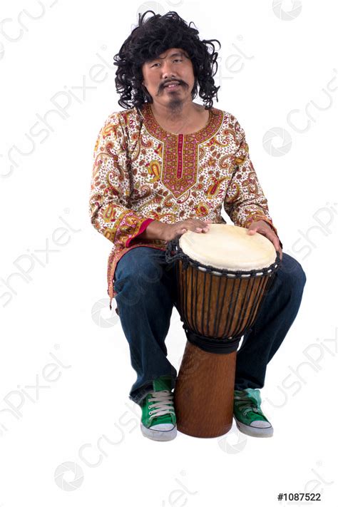 Man playing the djembe - stock photo 1087522 | Crushpixel