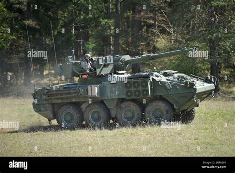 US Army soldiers in a M1128 Stryker Mobile Gun System assigned to Apache Company, 1st Squadron ...