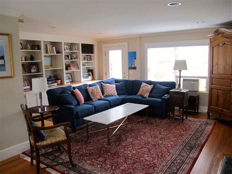 I love this blue sofa with the red persian rug. Living room done! | Blue living room decor, Rugs ...
