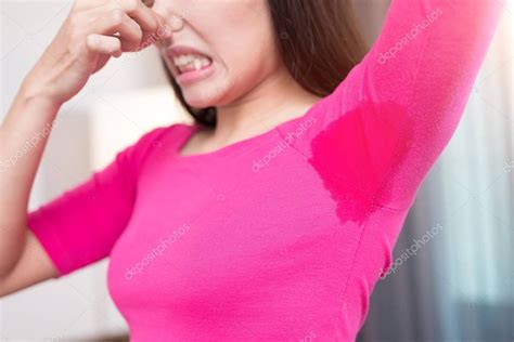 Woman with body odor problem — Stock Photo © ryanking999 #156209492