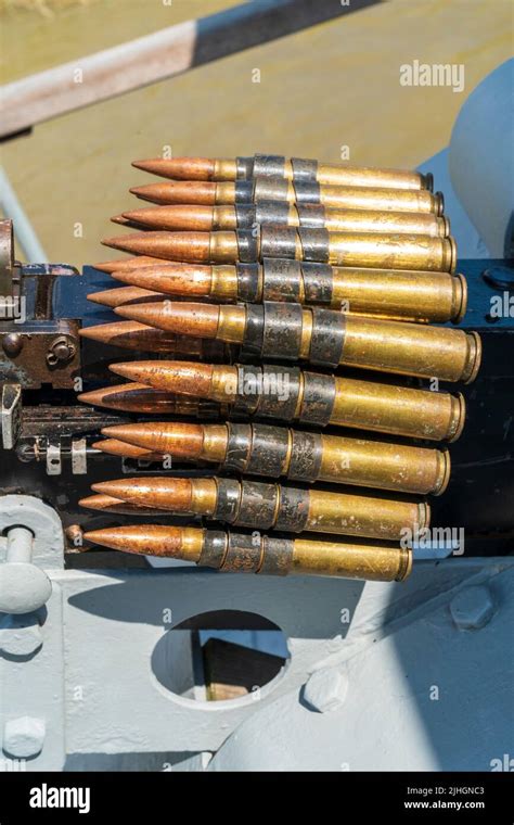 Close up of a cluster of 30 caliber ammunition, bullets, on top of a ...