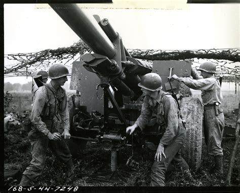 155mm Howitzer crew during a field exercise at Camp Atterbury, Indiana ...