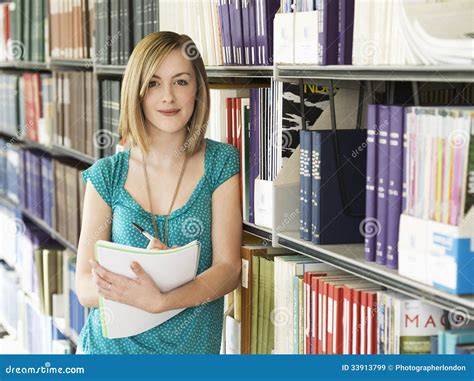 Female College Student in Library Stock Image - Image of intelligence, information: 33913799