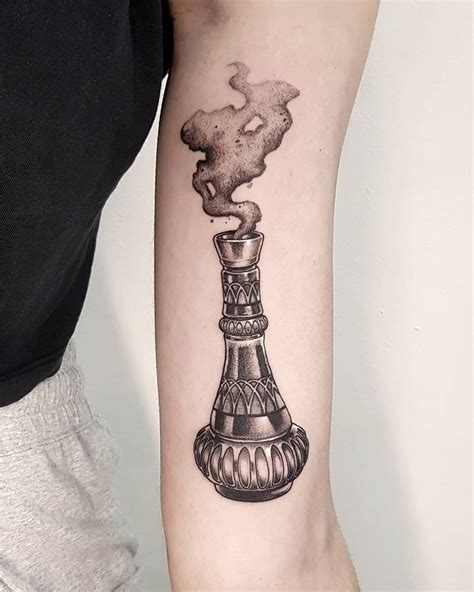 Genie bottle by @lukedoliver 🧞‍♂️ . . #tattooartist #tattoo #tattoos #ink #inked #tattooart #art ...