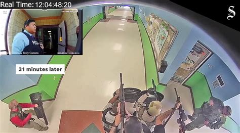 New Uvalde shooting video shows heavily armed officers waiting outside Robb Elementary classroom ...