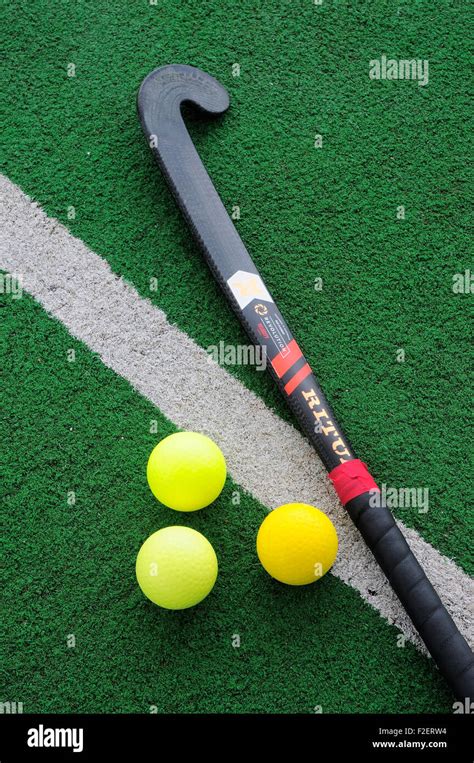 hockey stick green yellow Stock Photo - Alamy