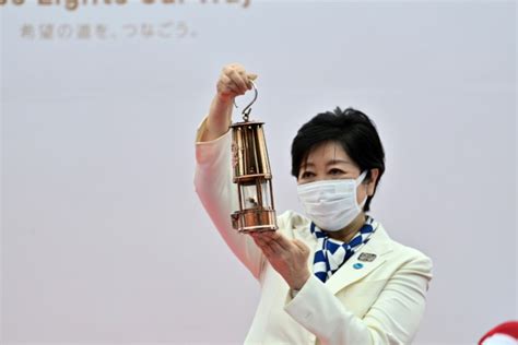 Bangkok Post - Olympic flame arrives in Tokyo for no-spectator relay