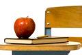 Free Stock Photo 7024 School desk with pencil and apple | freeimageslive