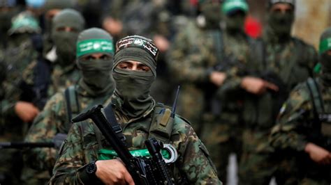 Hamas fighters parade in Gaza as Egyptian mediators try to firm up ceasefire