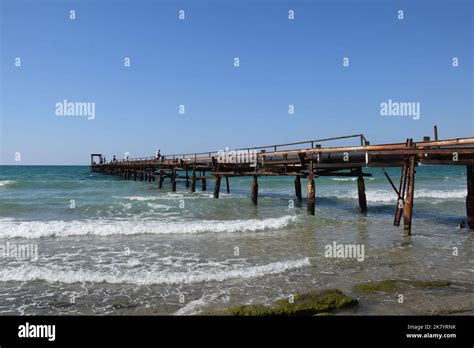 Fishermen on a Dock on Atlit Beach - Atlit Beach Reserve along Highway ...