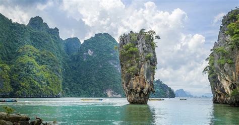 Paddling through the caves of Phang Nga Bay and making sure they are ...