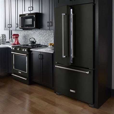 black kitchen cabinets with black appliances | Kitchen cabinets with ...