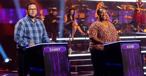 Who are Danny and Asabi? ‘Name That Tune’ contestants make host Jane Krakowski do burlesque and ...