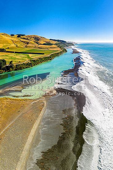 Hurunui River mouth aerial view looking north along bar towards Manuka ...