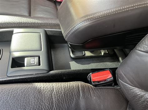 BMW i3 accessory that creates a hidden compartment and shelf under the ...