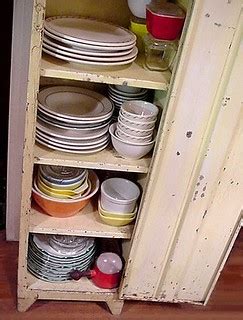Shabby old metal cabinet with restaurant ware china, Pyrex… | Flickr