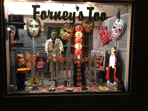 Check out this spooky store front window featuring retro-a-go-go! GhOoooOOlsville masks! | Retro ...