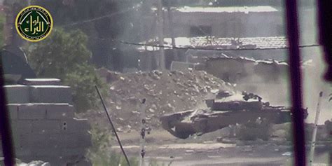 Syrian army tank fires a missile directly into camera in Jobar, a village on the outskirts of ...