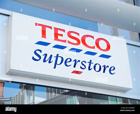 Tesco Superstore sign on outside wall UK Stock Photo - Alamy