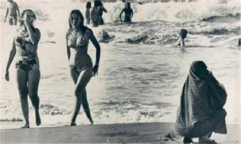 2 Different style of cultures enjoy a day at the beach in Iran in 1976 ...