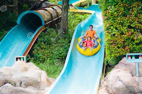 Kids on Water Slide. Family in Aqua Theme Park Stock Image - Image of beach, vacation: 295979033