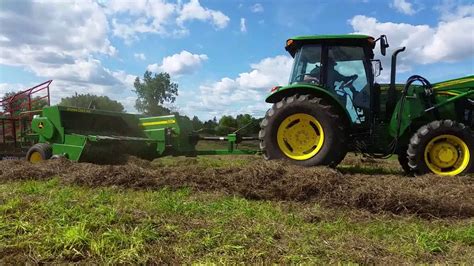 John Deere Square Hay Baler 328, making small bales - YouTube