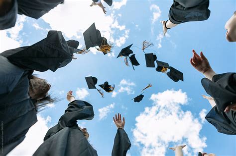 "Grad: Recent Graduates Toss Their Caps In The Air" by Stocksy Contributor "Sean Locke" - Stocksy