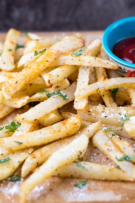 Simple and delicious recipe for homemade french fries. Seasoning and coated with oil and baked ...