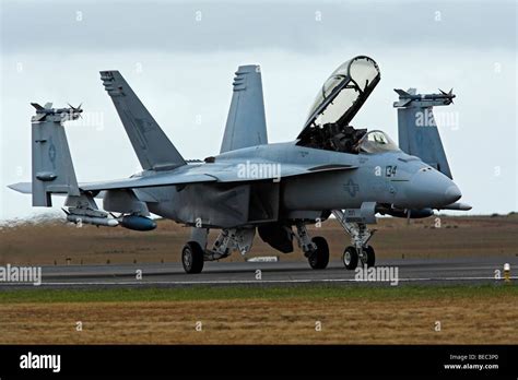 F/A-18 Super Hornet Jet Fighter on Runway with Folded Wings Stock Photo ...