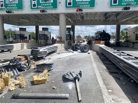 Toll plaza worker, 2 others hurt after tractor-trailer crashes into I-75 toll plaza - WINK News