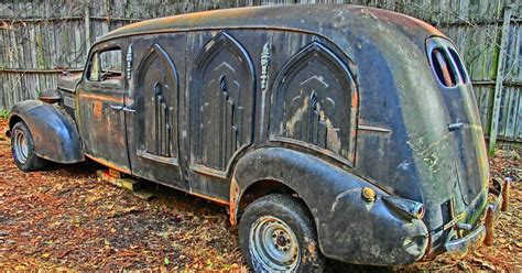 10 Haunting Pics Of Abandoned Hearses