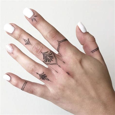 40 Tiny Finger Tattoos That Define Perfection - TattooBlend