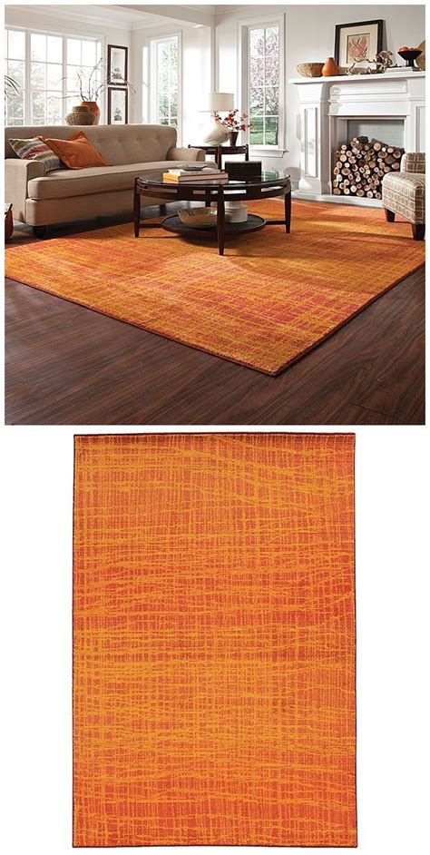 Image result for rug with tones of neutral and red and orange | Living ...