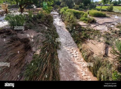 Damage caused by flash flooding after vegetation loss upstream after a ...