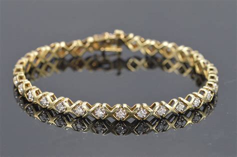 8.8g 10K 0.90 CTW Diamond "X" & "O" Tennis Style Bracelet 7.25 Yellow Gold | Property Room