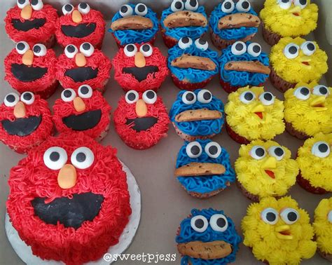 Elmo cake with elmo, cookie monster, and big bird cupcakes by ...