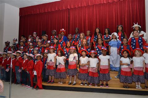 The kids of Monte Vista Elementary School gather on stage to sign and ...