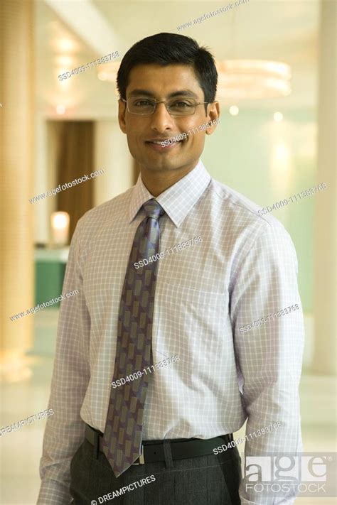 Indian businessman smiling, Stock Photo, Picture And Royalty Free Image ...