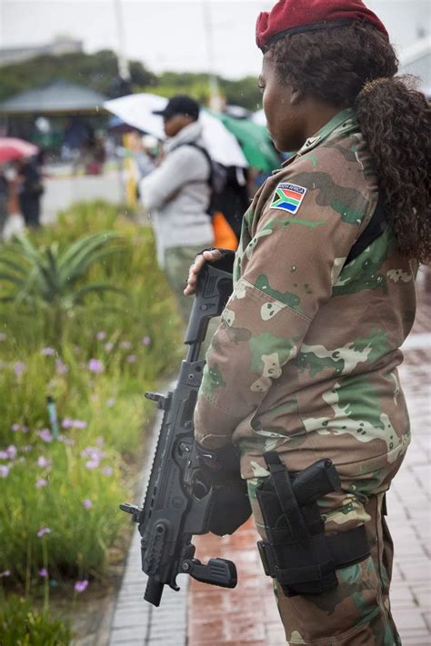 A South African Military Police officer, armed with a RONI carbine conversion for the Vektor Z88 ...