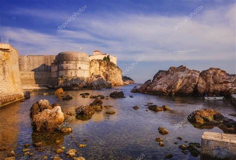 Dubrovnik Old City walls at sunset Stock Photo by ©anatema 73924875