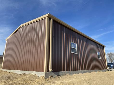 RMB5 - 26x40 Red Iron Metal Building | WolfSteel Buildings