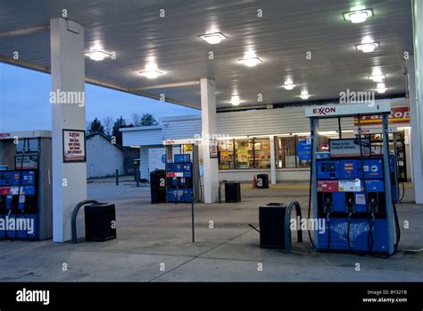 Exxon gas station with pumps Stock Photo - Alamy