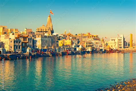 View of Gomti Ghat and Hindu Temple "Shree Dwarkadhish". Dwarka, Gujarat, India Stock Photo ...