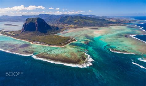 Famous view of Le Morne Brabant from a helicopter in Mauritius, a UNESCO World Heritage Site. By ...